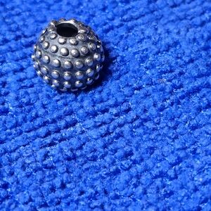 Pandora Silver Textured Dome Spacer Bead on Blue